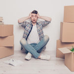 Student checkered casual shirt outfit space place people bad difficult concept. Exhausted frustrated going crazy guy touching head with hands crossed legs confused about the amount of belongings